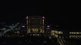 4.8K aerial stock footage of Gaylord National Resort & Convention Center, National Harbor, Maryland, night Aerial Stock Footage | AX77_017
