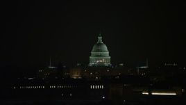 4.8K aerial stock footage of the United States Capitol building in Washington, D.C., night Aerial Stock Footage | AX77_054