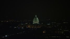 4.8K aerial stock footage of the United States Capitol Building and dome in Washington, D.C., night Aerial Stock Footage | AX77_071