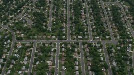 4.8K aerial stock footage of suburban streets and neighborhoods with trees, Manassas, Virginia Aerial Stock Footage | AX78_010E