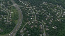 4.8K aerial stock footage of suburban homes, streets, trees, light traffic on Fairfax County Parkway, Herndon, Virginia Aerial Stock Footage | AX78_036E
