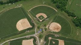 4.8K aerial stock footage approaching baseball fields at OBGC Community Park in Olney, Maryland Aerial Stock Footage | AX78_049
