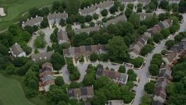 4.8K aerial stock footage approaching town houses on Fairway Hills Golf Course in Columbia, Maryland Aerial Stock Footage | AX78_069