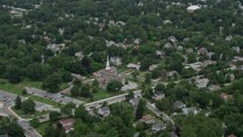 4.8K aerial stock footage approaching Catonsville Presbyterian Church and homes in Catonsville, Maryland Aerial Stock Footage | AX78_076E