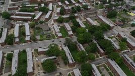 4.8K aerial stock footage flying over public housing, Sweet Prospect Baptist, Baltimore City Correctional Center, Maryland Aerial Stock Footage | AX78_093