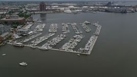 4.8K aerial stock footage of boats at the Baltimore Marine Center, Maryland Aerial Stock Footage | AX78_104