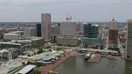 4.8K aerial stock footage of Downtown Baltimore skyscrapers, office buildings, and Harborplace waterfront pavilions in Maryland Aerial Stock Footage | AX78_110