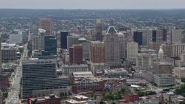 4.8K aerial stock footage flying by skyscrapers and city buildings in Downtown Baltimore, Maryland Aerial Stock Footage | AX78_114E