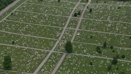 4.8K aerial stock footage of gravestones and green lawns at Baltimore Cemetery in Maryland Aerial Stock Footage | AX78_120