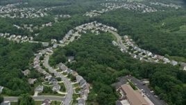 4.8K aerial stock footage flying over suburban houses by Abingdon Fire Company in Abigdon, Maryland Aerial Stock Footage | AX78_144