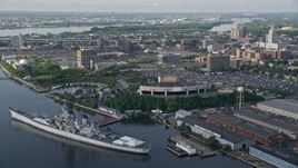 4.8K aerial stock footage approaching USS New Jersey on Delaware River, BB&T Pavilion, and Balzano Marine Terminal, Camden, New Jersey Aerial Stock Footage | AX79_088E