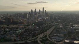 4.8K aerial stock footage of I-676 to Downtown Philadelphia skyline, Pennsylvania, Sunset Aerial Stock Footage | AX80_004