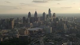 4.8K aerial stock footage of the Downtown Philadelphia skyline and Pennsylvania Convention Center, Pennsylvania, Sunset Aerial Stock Footage | AX80_005