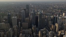 4.8K aerial stock footage of Downtown Philadelphia skyscrapers, city buildings and urban neighborhoods in Pennsylvania, Sunset Aerial Stock Footage | AX80_011E