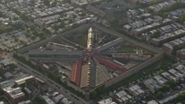 4.8K aerial stock footage of Eastern State Penitentiary in Philadelphia, Pennsylvania, Sunset Aerial Stock Footage | AX80_015