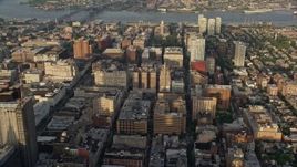 4.8K aerial stock footage of office and apartment buildings in Downtown Philadelphia, Pennsylvania, Sunset Aerial Stock Footage | AX80_019
