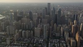 4.8K aerial stock footage of Downtown Philadelphia skyscrapers and high-rises in Pennsylvania, Sunset Aerial Stock Footage | AX80_021E