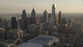 4.8K aerial stock footage of skyscrapers in Downtown Philadelphia, Pennsylvania at sunset Aerial Stock Footage | AX80_060