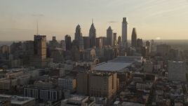 4.8K aerial stock footage approaching the Downtown Philadelphia skyline and convention center in Pennsylvania, Sunset Aerial Stock Footage | AX80_078E