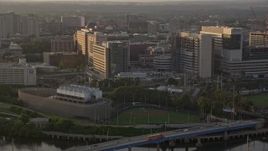 4.8K aerial stock footage of Meiklejohn Stadium and Children's Hospital of Philadelphia, Pennsylvania, Sunset Aerial Stock Footage | AX80_089
