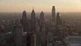 4.8K aerial stock footage approaching City Hall and Downtown Philadelphia skyscrapers, Pennsylvania, Sunset Aerial Stock Footage | AX80_101