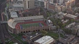 4.8K aerial stock footage of Franklin Field at University of Pennsylvania, West Philadelphia, Sunset Aerial Stock Footage | AX80_105