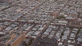 4.8K aerial stock footage of an urban neighborhood in South Philadelphia, Pennsylvania, Sunset Aerial Stock Footage | AX80_109E