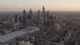 4.8K aerial stock footage of Downtown Philadelphia skyscrapers and Pennsylvania Convention Center, Sunset Aerial Stock Footage | AX80_117E