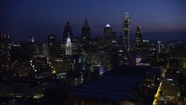 4.8K aerial stock footage of Downtown Philadelphia skyscrapers, city hall, and Pennsylvania Convention Center, Pennsylvania, Night Aerial Stock Footage | AX81_013E