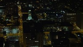 4.8K aerial stock footage of the Inquirer Building clock tower in Downtown Philadelphia , Pennsylvania, Night Aerial Stock Footage | AX81_057