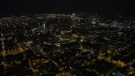 4.8K aerial stock footage orbit and approach Downtown Philadelphia skyscrapers at night in Pennsylvania Aerial Stock Footage | AX81_066E