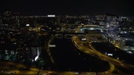 4.8K aerial stock footage flying over small bridges spanning Schuylkill River in Philadelphia, Pennsylvania, Night Aerial Stock Footage | AX81_075
