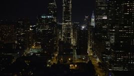 4.8K aerial stock footage flying by Downtown Philadelphia skyscrapers and streets, Pennsylvania, Night Aerial Stock Footage | AX81_076