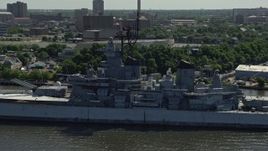 4.8K aerial stock footage flying by the battleship USS New Jersey, Camden, New Jersey Aerial Stock Footage | AX82_001