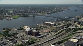 4.8K aerial stock footage of Benjamin Franklin Bridge and Delaware River, Philadelphia, Pennsylvania Aerial Stock Footage | AX82_006
