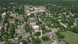 4.8K aerial stock footage flying over homes to approach shops and restaurants in Princeton, New Jersey Aerial Stock Footage | AX82_096