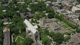 4.8K aerial stock footage flying by the Princeton University Chapel, Firestone Library, and campus halls in New Jersey Aerial Stock Footage | AX83_024