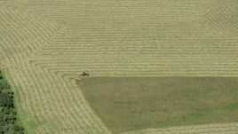 4.8K aerial stock footage of a tractor harvesting crops in Princeton, New Jersey Aerial Stock Footage | AX83_038