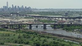 4.8K aerial stock footage of a small bridge over the Passaic River in Kearny, New Jersey Aerial Stock Footage | AX83_098