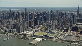 4.8K aerial stock footage flying by the Hudson Yards and Hell's Kitchen areas of Midtown Manhattan, New York City Aerial Stock Footage | AX83_111E