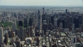 4.8K aerial stock footage flying by Midtown Manhattan skyscrapers seen from Hell's Kitchen, New York City Aerial Stock Footage | AX83_114E