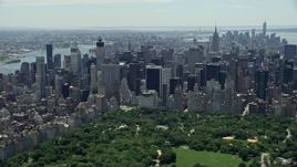 4.8K aerial stock footage of Lower and Midtown Manhattan skyscrapers seen from Central Park, New York City Aerial Stock Footage | AX83_118