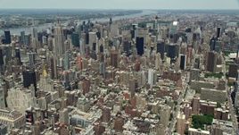 4.8K aerial stock footage of a view of Midtown Manhattan skyscrapers, New York City Aerial Stock Footage | AX83_126