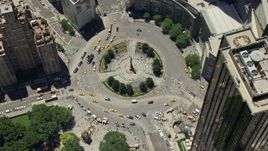 4.8K aerial stock footage tilting to a bird's eye view of Columbus Circle in Midtown Manhattan, New York City Aerial Stock Footage | AX83_141
