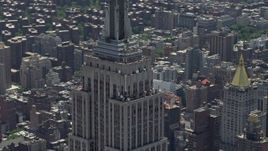 4.8K aerial stock footage of upper levels of the Empire State Building, Midtown Manhattan, New York City Aerial Stock Footage | AX83_145