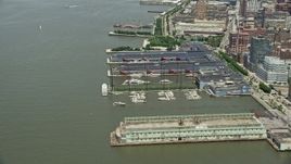 4.8K aerial stock footage of boats docked at Chelsea Piers, New York City Aerial Stock Footage | AX83_148