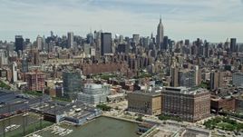 4.8K aerial stock footage of Midtown Manhattan cityscape seen from Chelsea Piers, New York City Aerial Stock Footage | AX83_149