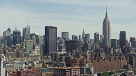 4.8K aerial stock footage of One Penn Plaza, Empire State Building and Midtown Manhattan skyscrapers, New York City Aerial Stock Footage | AX83_150