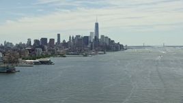 4.8K aerial stock footage approaching Freedom Tower and Lower Manhattan skyline from Hudson River, New York City Aerial Stock Footage | AX83_153