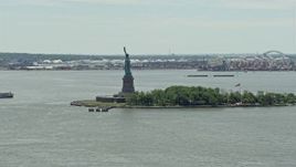 4.8K aerial stock footage orbiting Statue of Liberty in New York Harbor, New York City Aerial Stock Footage | AX83_174